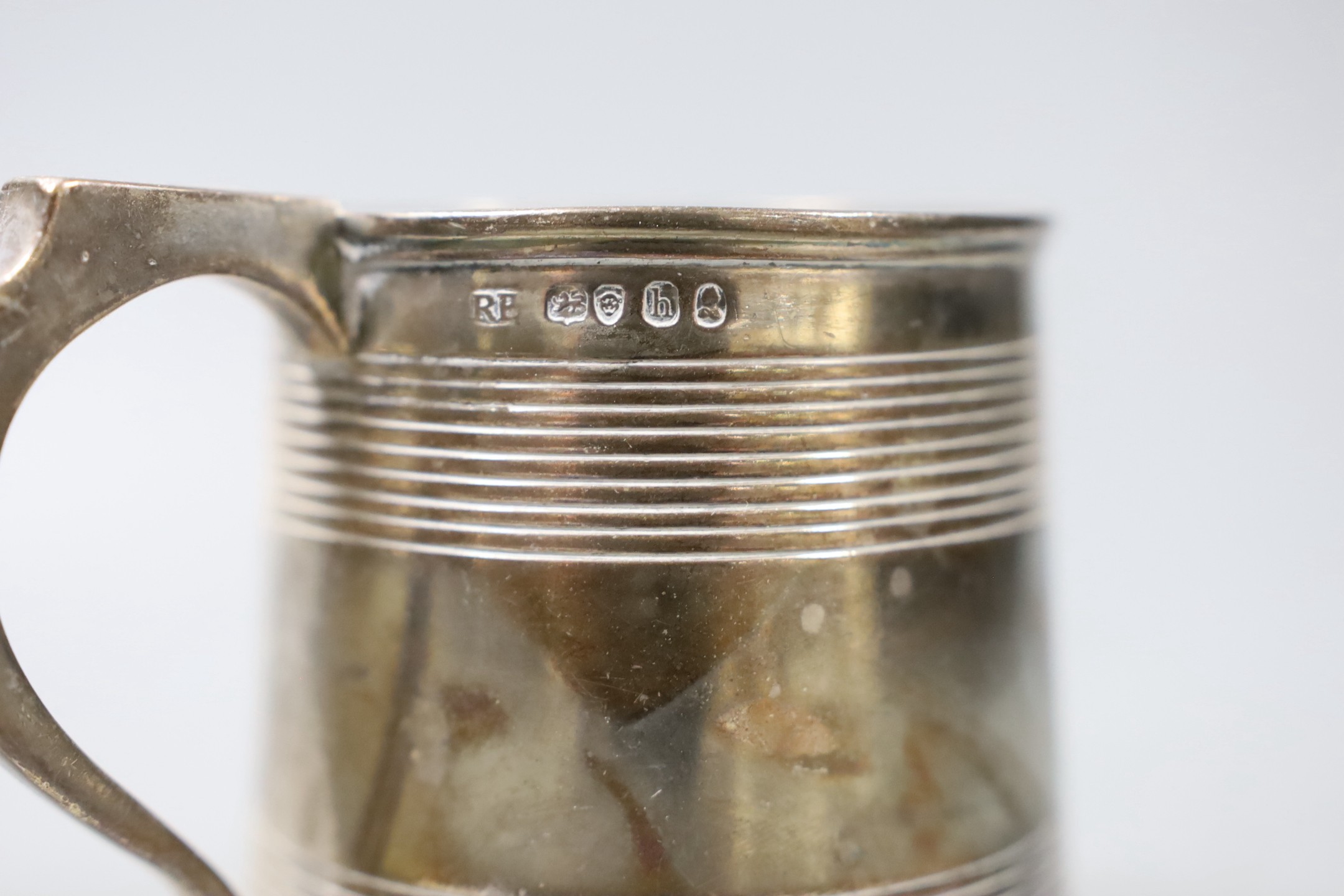 A George IV silver mug, with reeded bands and later? engraved initials, Robert Peppin, London, 1823, 83mm, 6.5oz.